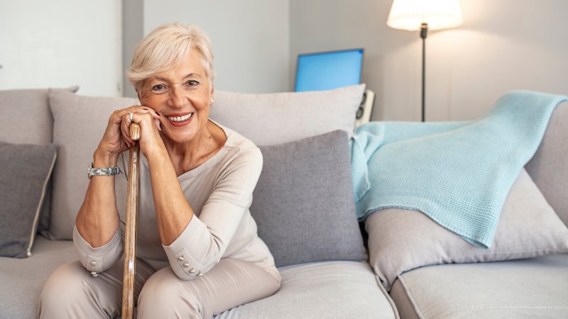 smiling senior wearing dentures