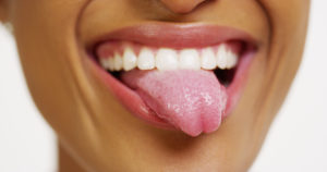woman smiling tongue hanging out